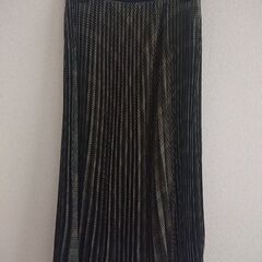 ユニクロ チェックﾌﾟリ－ツﾌレアロングスカ－ト🌼これからの季節...