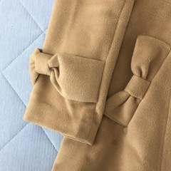 ファー付きダブルのフレアーコートの画像