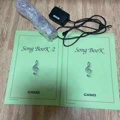 CASIO LK-511 電子ピアノ  ナビゲーション機能: 光鍵盤機能 　 椅子、スタンド付きの画像