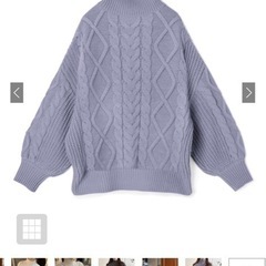 ケーブル編みスリットヘムニットトップスの画像