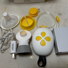 搾乳機と母乳ボトルセット　medela ソロ電動さく乳機の画像