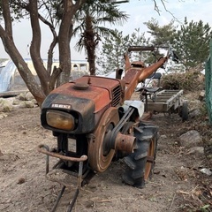 古い耕運機と荷車のセット