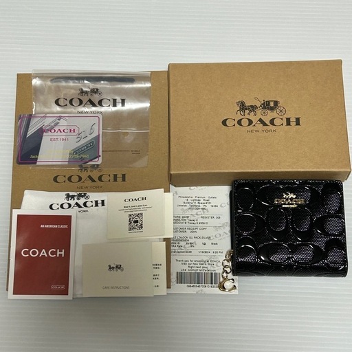 新品　コーチ　COACH　折り財布　黒　型押し　総柄　シグネチャー　レザー　凹凸　二つ折り財布