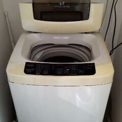 中古品　冷蔵庫電子レンジ洗濯機炊飯器オーブンと棚の画像