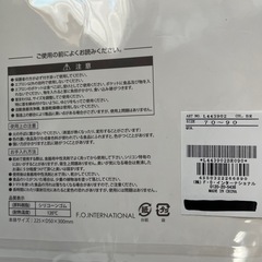 エプロンと赤ちゃん枕の画像