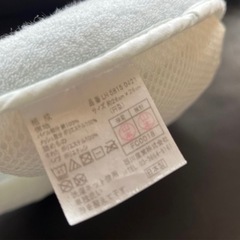 エプロンと赤ちゃん枕の画像