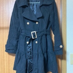 黒のコートお話中