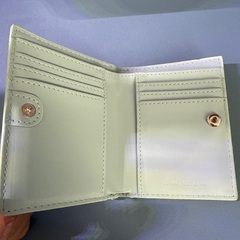 ニコアンド 折り財布の画像