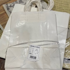 紙袋　レジ袋　包装紙の画像