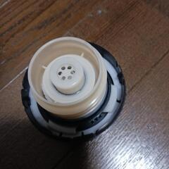 車関係の燃料タンクのフタの画像