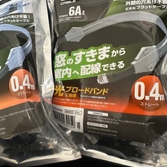 Cat6A対応LANケーブル(すき間用・ツメ折れ防止)とLAN中継コネクタ、保護テープセット(CAT6A)の画像
