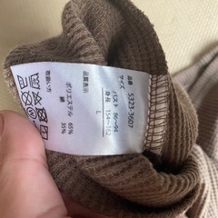 レディース トップスの画像