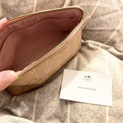 【新品未使用】COACHポーチの画像