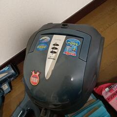 そうじきと紙パックの画像