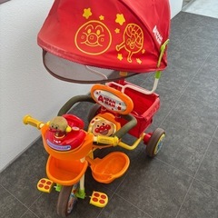 アンパンマンデラックスⅡ  三輪車 オレンジ サンシェード 安全ベルト かご付きの画像
