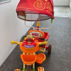 アンパンマンデラックスⅡ  三輪車 オレンジ サンシェード 安全ベルト かご付きの画像