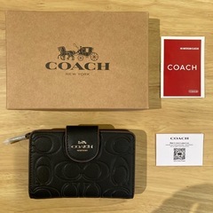 コーチ　
2つ折り財布【新品未使用】