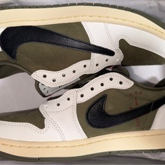 Travis Scott × Nike Air Jordan 1...