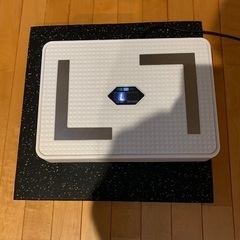 ブルブルマシーンとゴムマットの画像