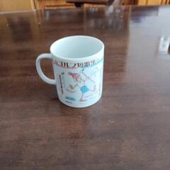 ゴルフ短歌が記入のコーヒーカップの画像