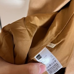 茶色コートの画像