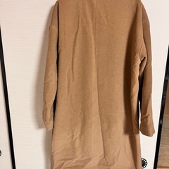 茶色コートの画像