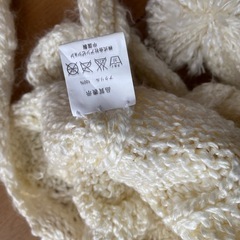 ボンボン付ニット帽の画像