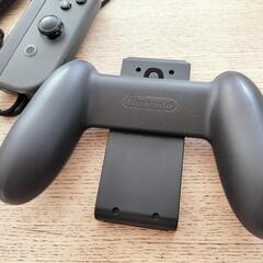 Nintendo Switch ジョイコンとグリップ)左右 純正　ジャンクの画像