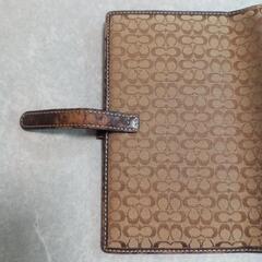 COACH手帳ケースの画像