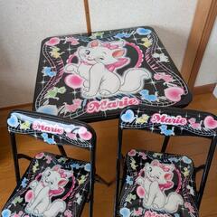 折りたたみテーブルとイス3点セットの画像