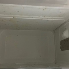 シンプルな白の電子レンジの画像