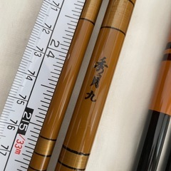 ヘラブナ釣り　竿、竿かけ、針外し、ウキ、パラソルの画像