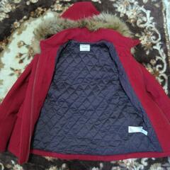 毛皮フード付きコートの画像