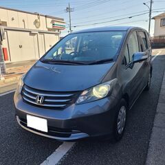 フリード1.5G　ジャストセレクション　H21　車検8/8　走行91000キロ　社外HDDナビ＆フルセグTV　カラーバックカメラ　ETC　左側パワースライド　キセノン　３列７人乗り　新車時より記録簿12枚の画像