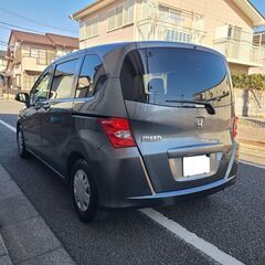 フリード1.5G　ジャストセレクション　H21　車検8/8　走行91000キロ　社外HDDナビ＆フルセグTV　カラーバックカメラ　ETC　左側パワースライド　キセノン　３列７人乗り　新車時より記録簿12枚の画像
