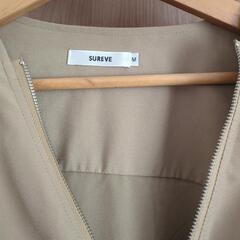 ノーカラー アウター 薄手 服の画像