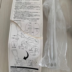 子供用自転車の補助輪とサポート用ハーネスの画像