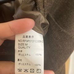 ひざ丈　茶色スカートの画像