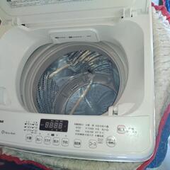棚と洗濯機のセットの画像