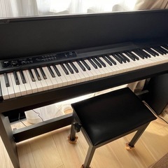 電子ピアノと椅子のセット