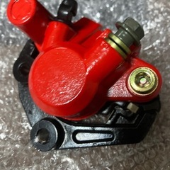 グランドアクシス100ブレーキキャリパーの画像