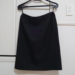 黒のスーツの画像