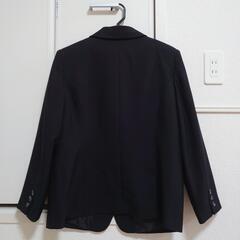 黒のスーツの画像