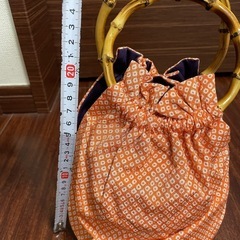 浴衣と帯と下駄とバックの画像