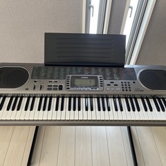 電子キーボード　CASIO 美品　光ナビゲーション　専用スタンド付の画像