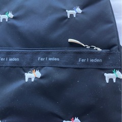 美品黒のリュックサック　犬柄の画像