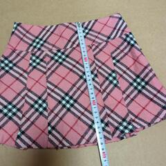 120cm？ピンク系チェック プリーツスカートの画像