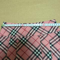 120cm？ピンク系チェック プリーツスカートの画像