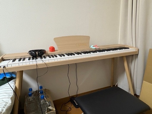 取引中 電子ピアノ