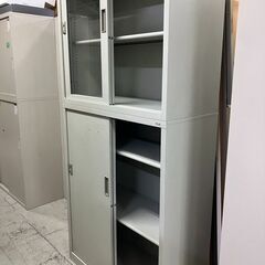 中古　PLUS　プラス　上段ガラス　上下書庫　上下引違い書庫　上下書庫セット　引き戸　2段書庫　スチールキャビネット　書類棚　鍵付　愛知県 一宮市 名古屋 稲沢 江南 岩倉 岐阜 羽島 各務ヶ原 三重 愛知 グッドプライス一宮の画像